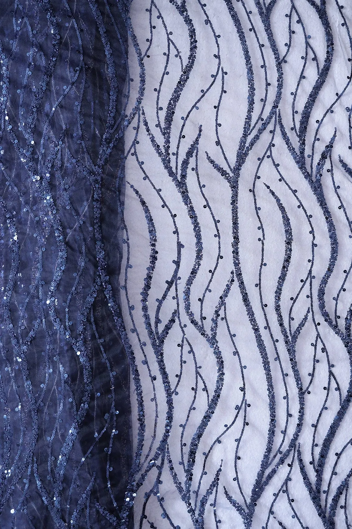 Beautiful Sequins With Blue Thread Wavy Embroidery Work On Navy Blue Soft Net Fabric