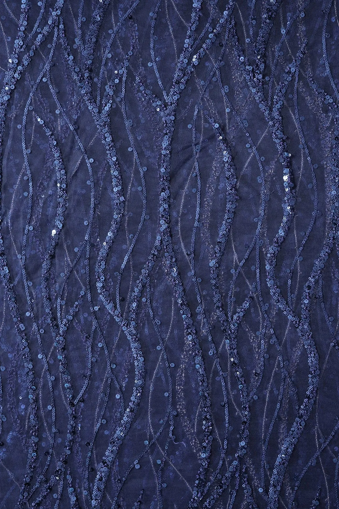 Beautiful Sequins With Blue Thread Wavy Embroidery Work On Navy Blue Soft Net Fabric