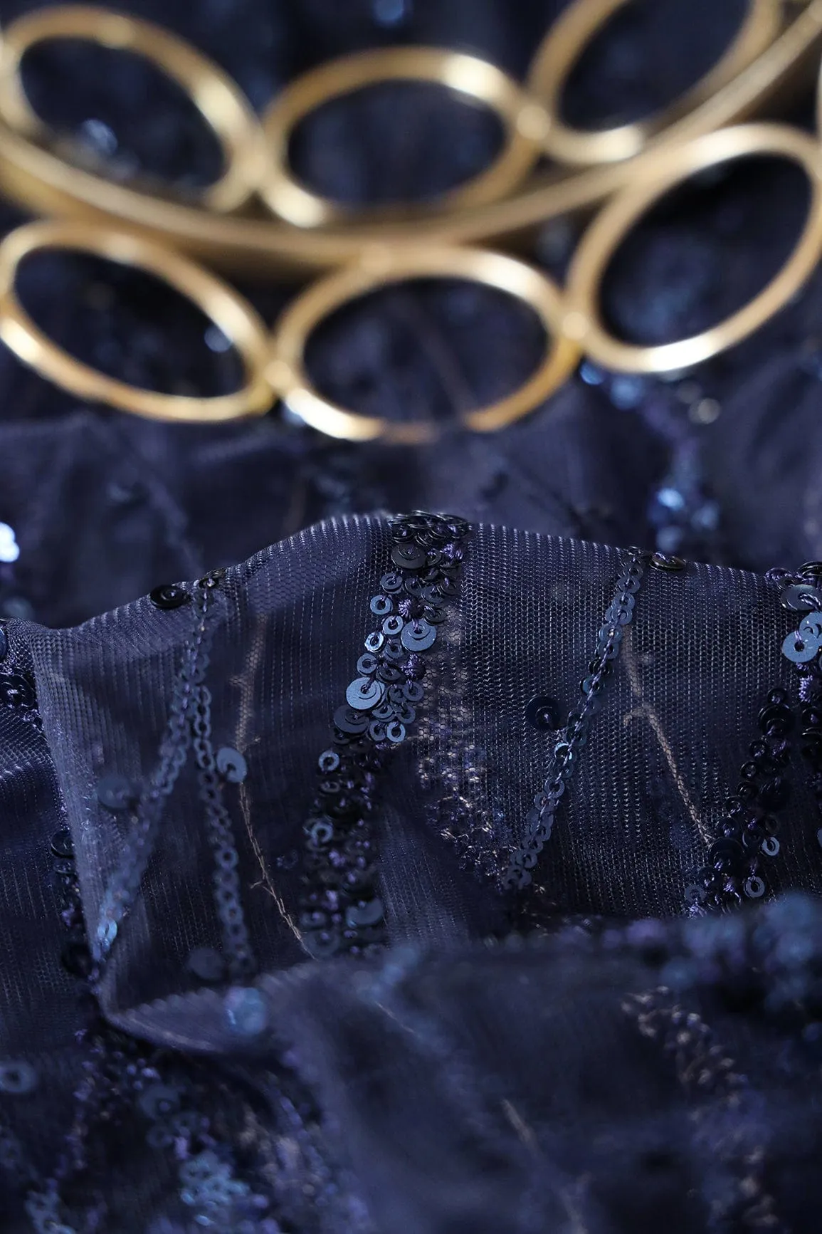 Beautiful Sequins With Blue Thread Wavy Embroidery Work On Navy Blue Soft Net Fabric