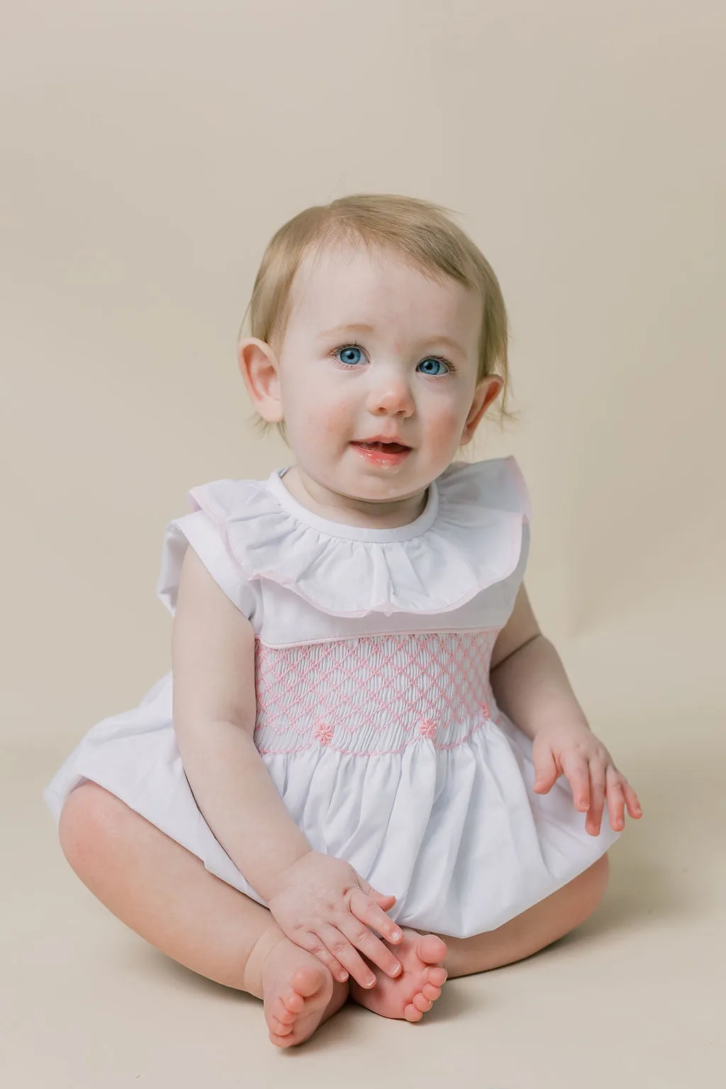 Smocked Toulouse Romper in White with Pink Ruffle Collar